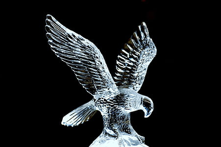 3D glass eagle figurine against black background thumbnail