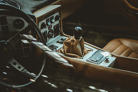 brown and black gear shift lever at neutral thumbnail