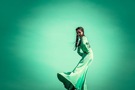 woman wearing long-sleeved dress thumbnail