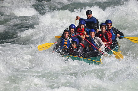 people wearing blue and red vests thumbnail