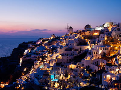 white concrete houses open their lights thumbnail