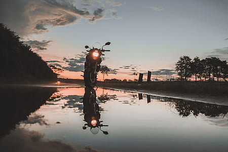 low angle photography of motorcycle on road thumbnail