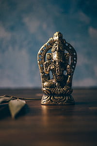shallow focus photo of Ganesha figure thumbnail