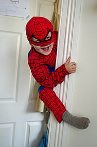 boy wearing Spider-Man costume thumbnail