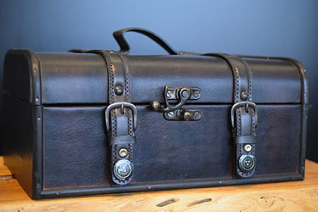 black chest box on brown wooden surface thumbnail