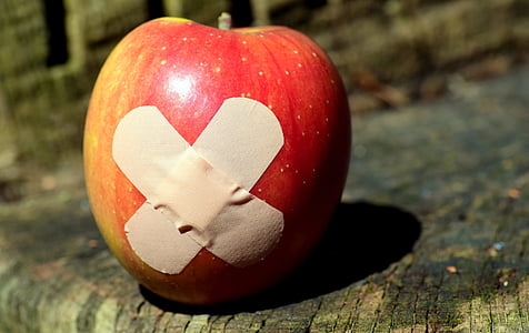 apple fruit with band aid thumbnail