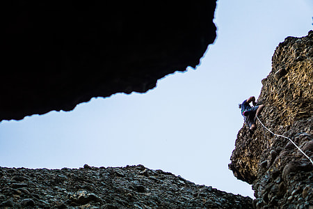 person climbing on mountain thumbnail