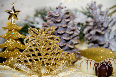 gold-colored tiara near gold Christmas tree thumbnail