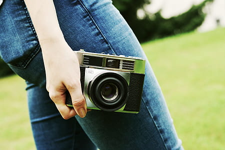 person holding camera thumbnail