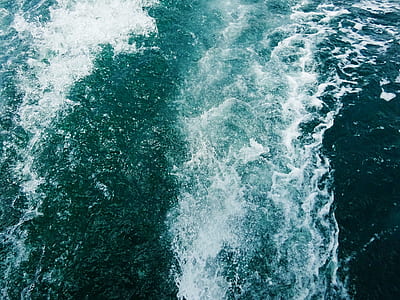wavy ocean during daytime thumbnail