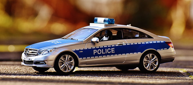 close-up photo of blue and gray police vehicle toy thumbnail