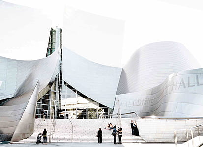 people walking and standing near building thumbnail