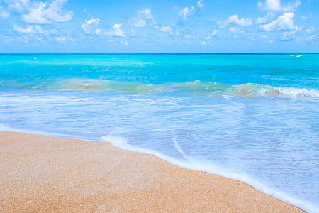 blue calm body of water during daytime thumbnail