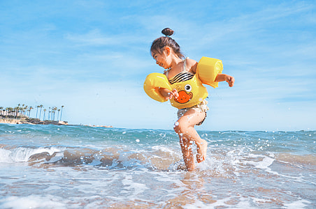 girl running on sea shore thumbnail