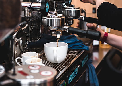 person using espresso machine thumbnail