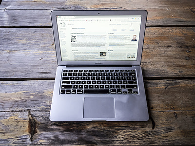 turned-on gray laptop computer thumbnail