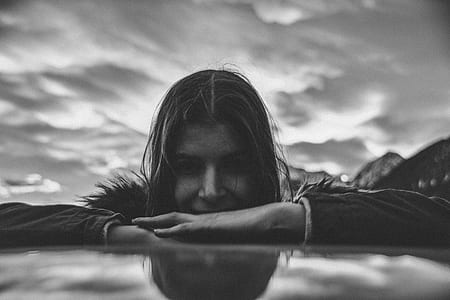 grayscale photo of smiling woman thumbnail