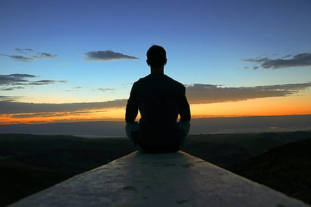 silhouette photo of a man on concrete floor thumbnail