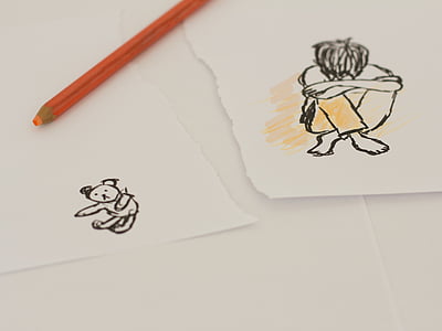 boy sitting hand drawn sketch on torn paper thumbnail