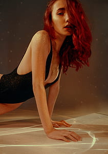 woman wearing black leotards in push up form thumbnail