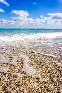 seashore body of water during daytime thumbnail