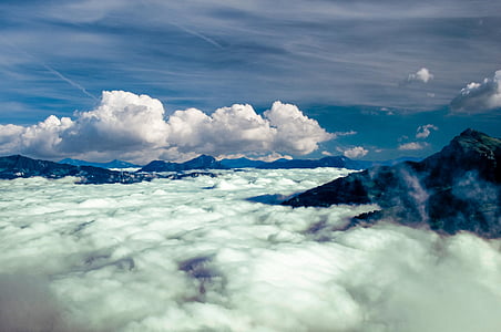 aerial photography of mountains and clouds thumbnail