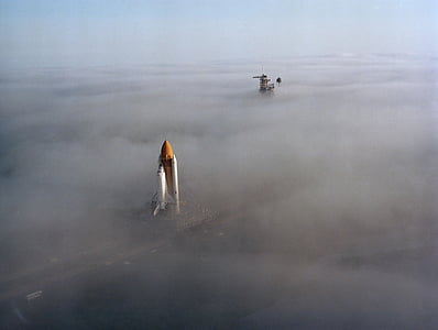 space shuttle with cloudy sky thumbnail