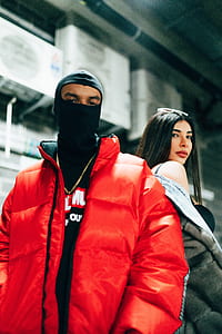 man wearing red full-zip bubble jacket thumbnail
