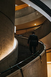 man walking on stairs thumbnail