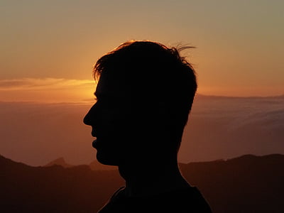 silhouette photo of man facing left side thumbnail