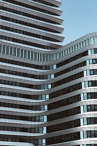 white high-rise concrete building thumbnail