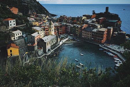 photo of house surrounding body of water thumbnail