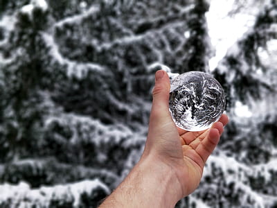 person holding frosted sphere thumbnail