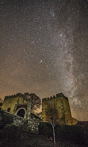 brown castle during night time thumbnail
