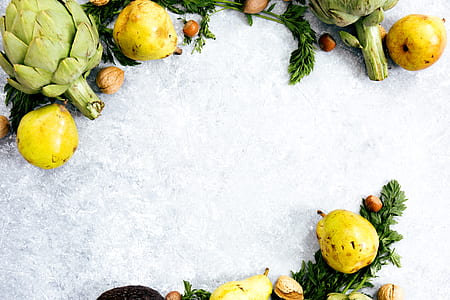 yellow fruits on white surface thumbnail