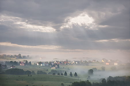 Green Grass Field during Cloudy Sky thumbnail