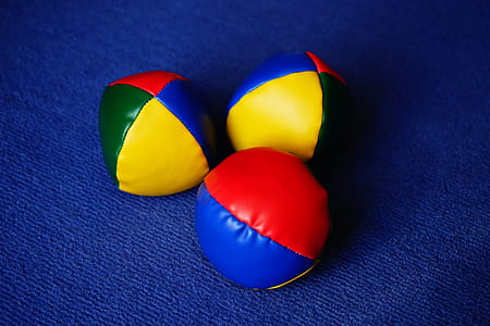 three assorted-color ball decors thumbnail