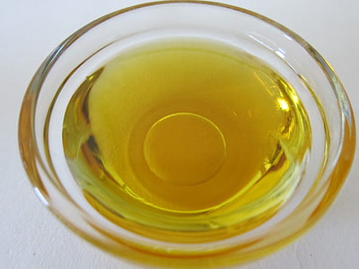 yellow liquid inside of clear glass bowl thumbnail