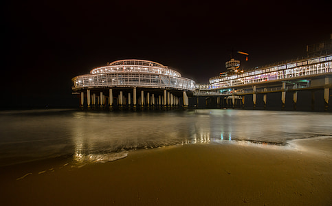 lighted pier near seashore thumbnail
