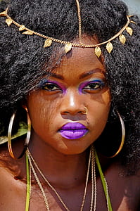 woman in purple lipstick and eyeshadow thumbnail