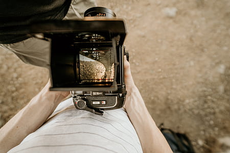 person using TLR camera thumbnail