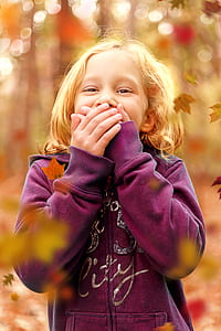 Toddler Wearing Purple Sweatshirt thumbnail