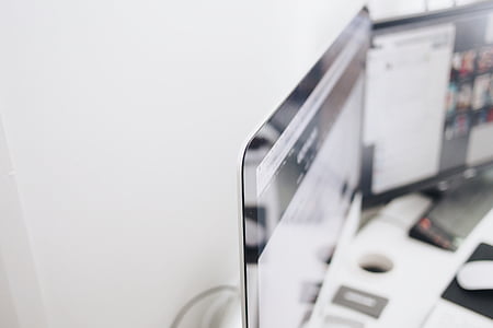 view of two flat screen computer monitors thumbnail