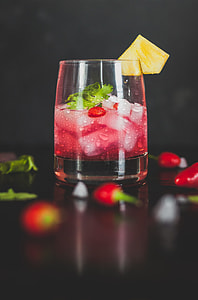 cocktail in glass surrounded by chili thumbnail