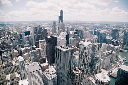 bird's eyeview photography of high rise buildings thumbnail