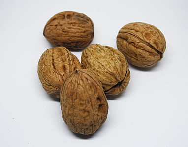 five brown walnuts thumbnail