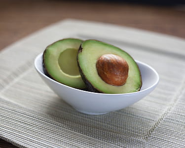 sliced avocado in bowl thumbnail