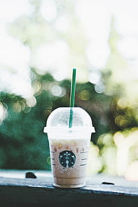 Starbucks coffee with green straw thumbnail