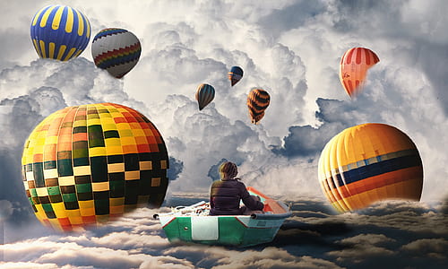 boy sitting on boat surrounded by hot air balloons painting thumbnail