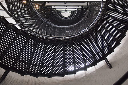 low angle photography of spiral stair thumbnail